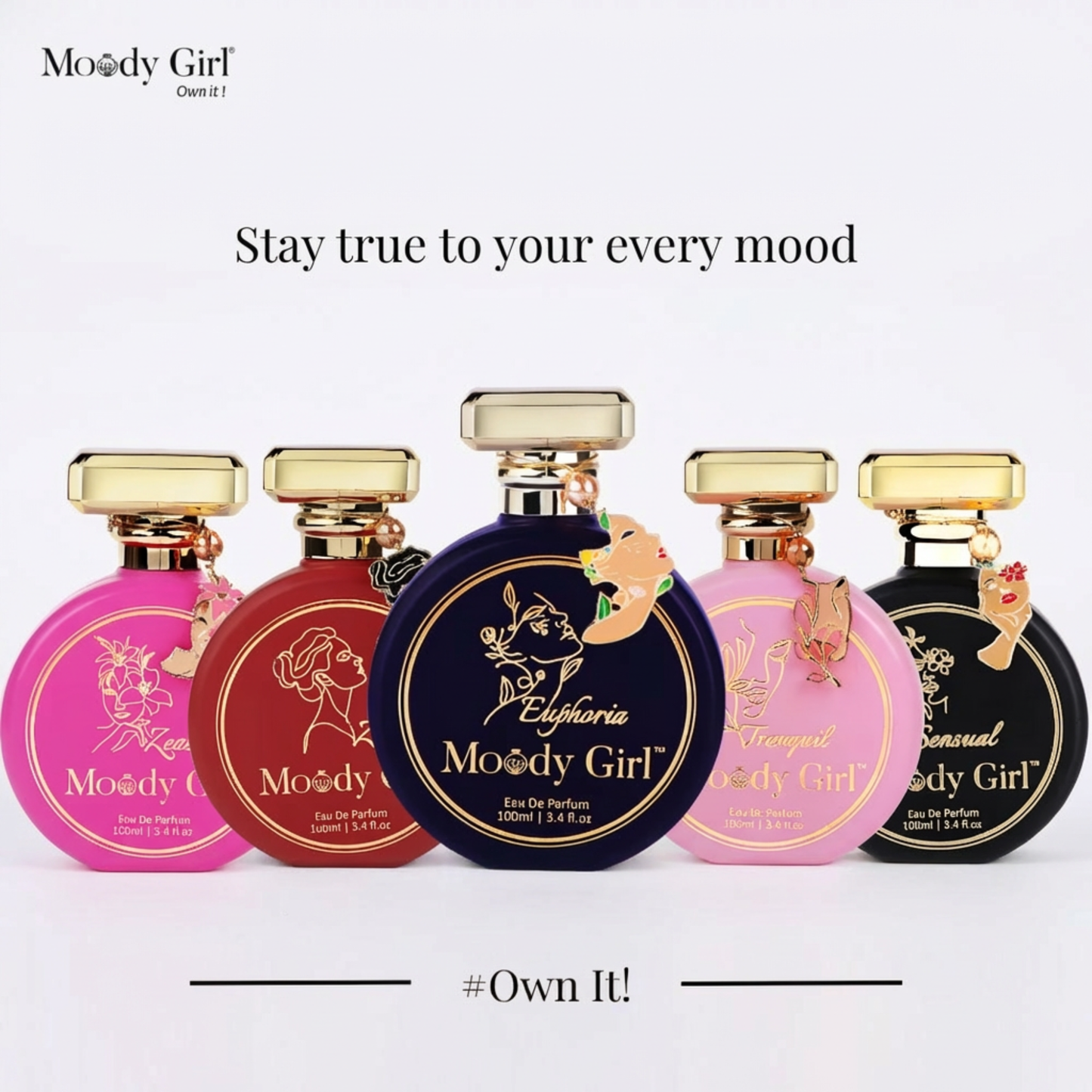 Collection of Moody Girl perfume bottles with gold caps on a white background