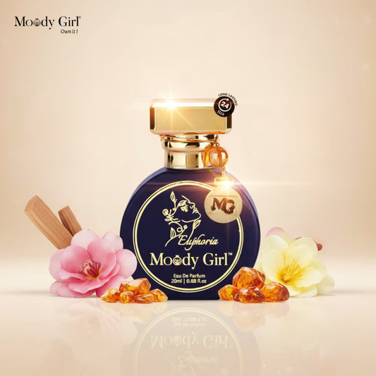 Moody Girl Euphoria perfume bottle with flowers and amber on a beige background