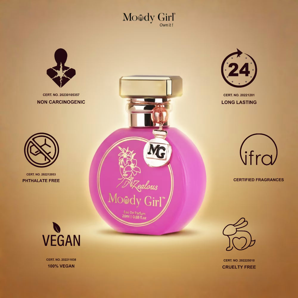 Pink perfume bottle with gold cap on a beige background, featuring 'Moody Girl' branding and certification logos.