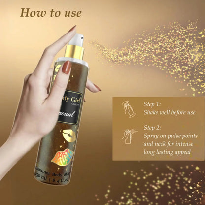 Hand holding a spray bottle with 'Body Girl' branding on a gold background