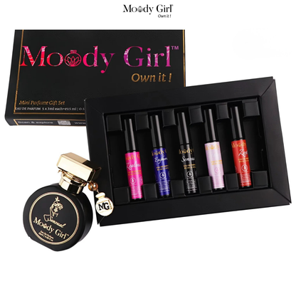 Moody Girl mini perfume gift set with a black box containing small bottles and a round perfume bottle on a white background.