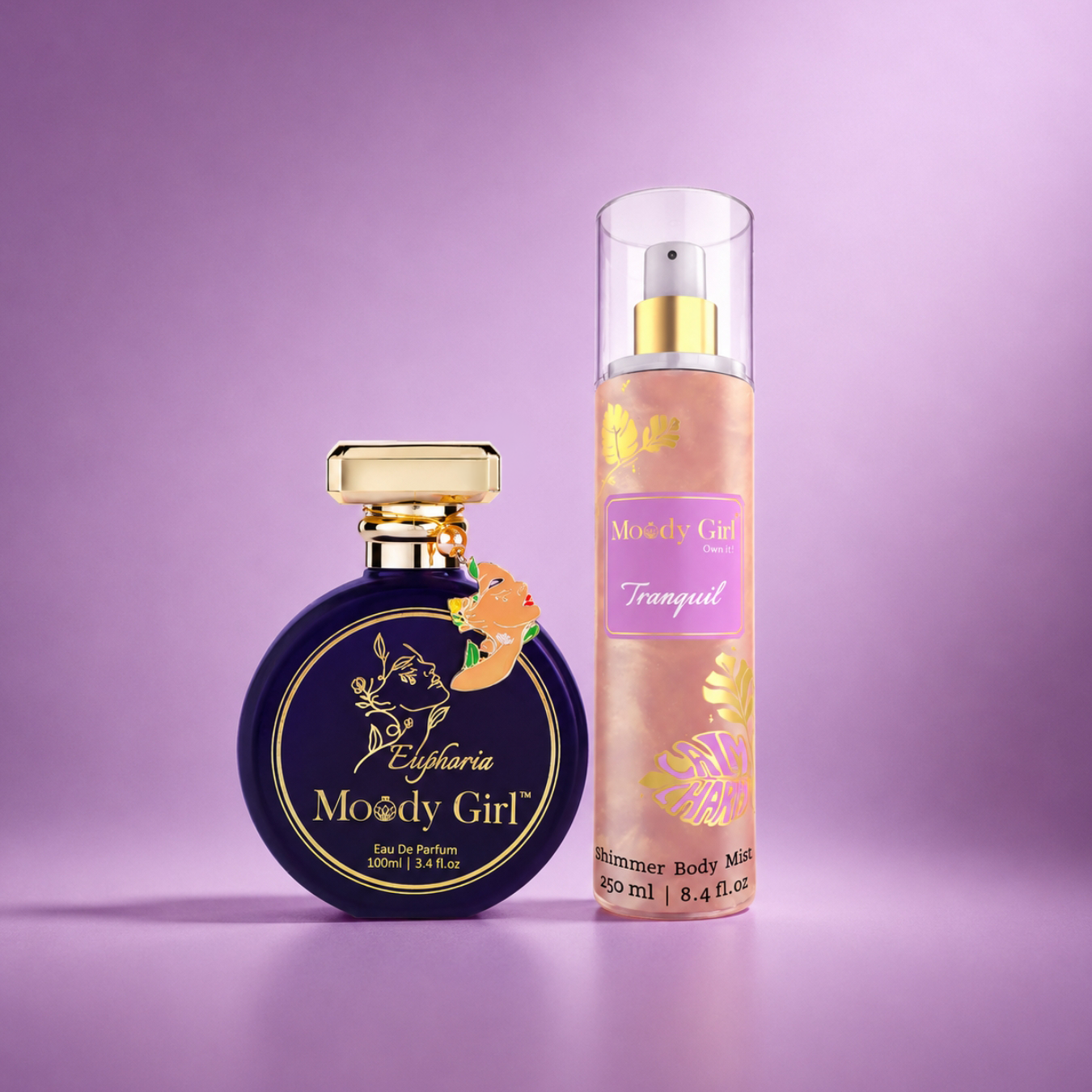 Two perfume bottles from the brand 'Moody Girl' on a purple background