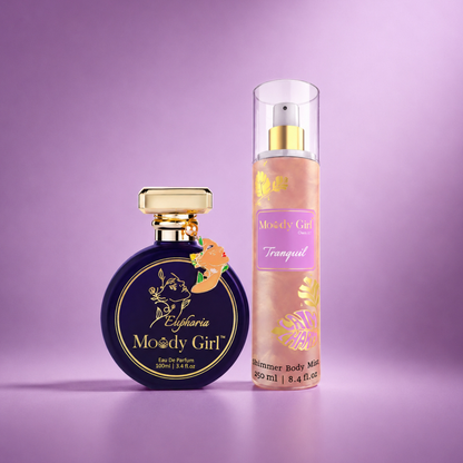 Two perfume bottles from the brand 'Moody Girl' on a purple background