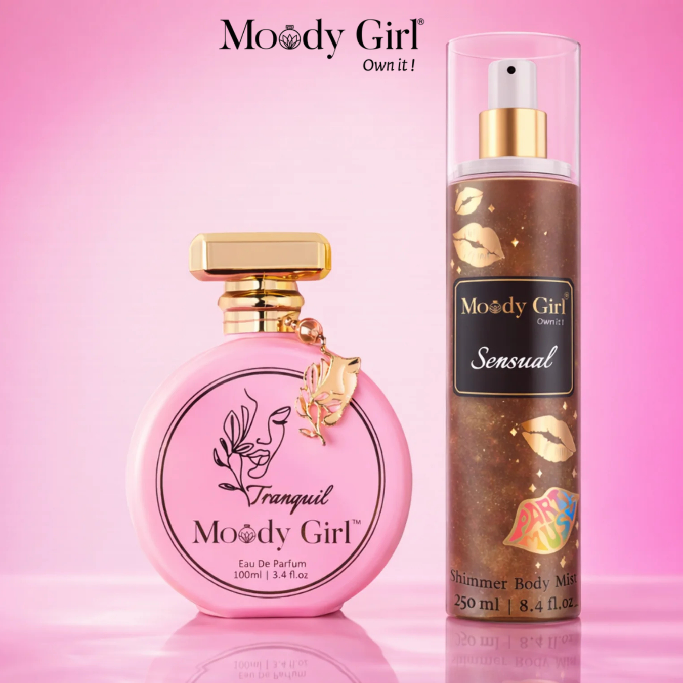 Two Moody Girl perfume bottles on a pink background