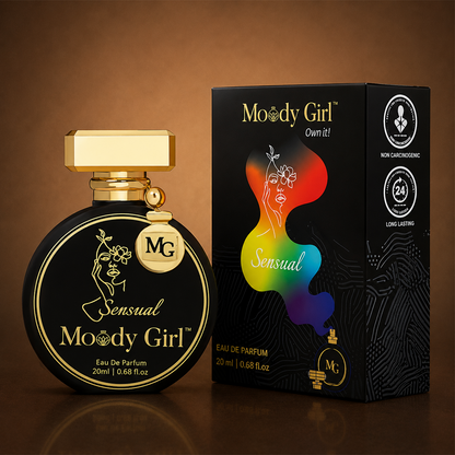 Moody Girl Sensual Eau De Parfum bottle and its retail box, both in black with gold detailing and a colorful rainbow graphic, set against a warm brown gradient background.