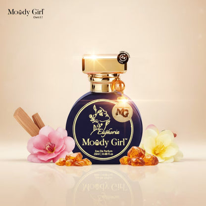Moody Girl Euphoria perfume bottle with flowers and amber on a beige background