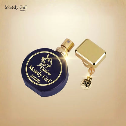Perfume bottle with gold cap and 'Moody Girl' branding on a beige background