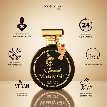 Perfume bottle with 'Moody Girl' branding and certification icons on a beige background