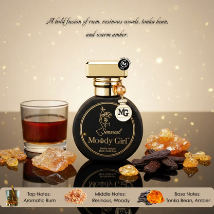 Bottle of 'Sensual Moody Girl' perfume with ingredients and description on a reflective surface.