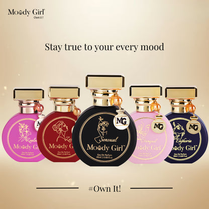 Five Moody Girl perfume bottles with different colored bottles and gold caps on a beige background.