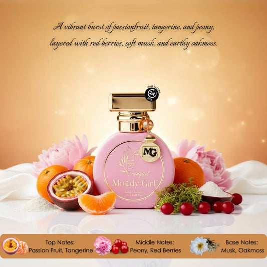 Pink perfume bottle with fruit and floral elements on a soft background