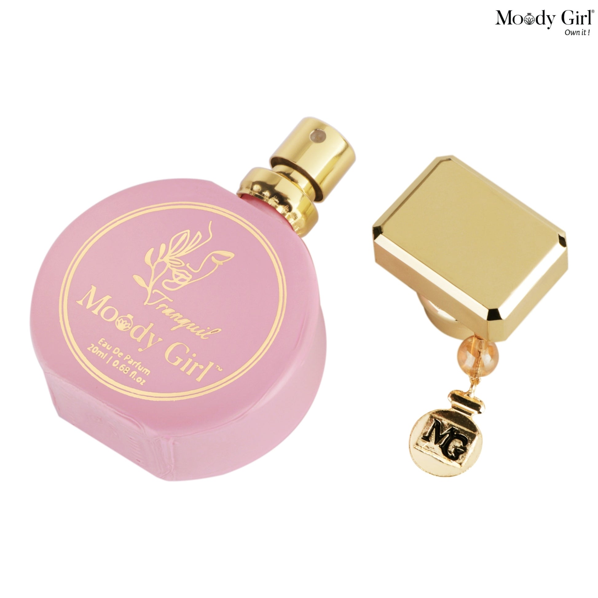 Pink perfume bottle with gold cap and 'Moody Girl' branding on a white background