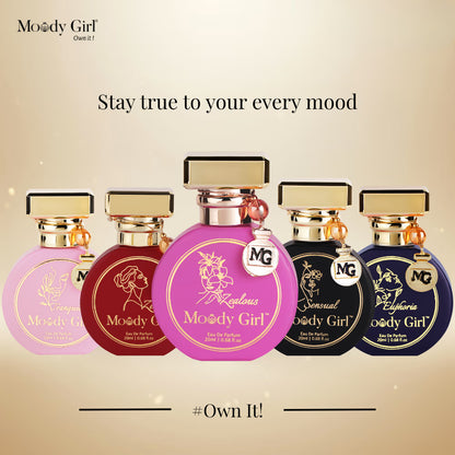 Five Moody Girl perfume bottles on a beige background with text 'Stay true to your every mood' and '#Own It!'.