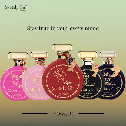 Five Moody Girl perfume bottles with different colored labels on a light green background.