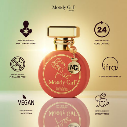 Red perfume bottle with gold cap on a beige background, featuring 'Moody Girl' branding and certification logos.