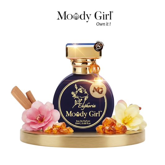 Moody Girl perfume bottle with flowers and packaging elements on a white background