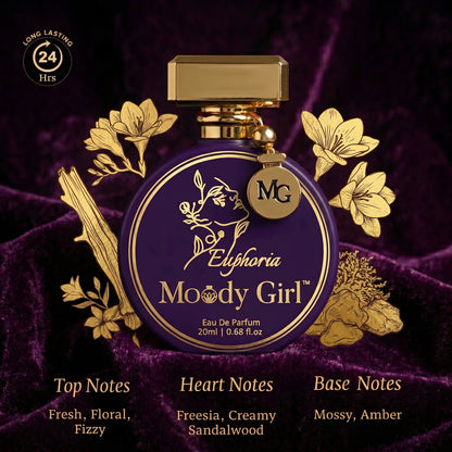 Perfume bottle labeled 'Moody Girl' with gold accents on a dark background