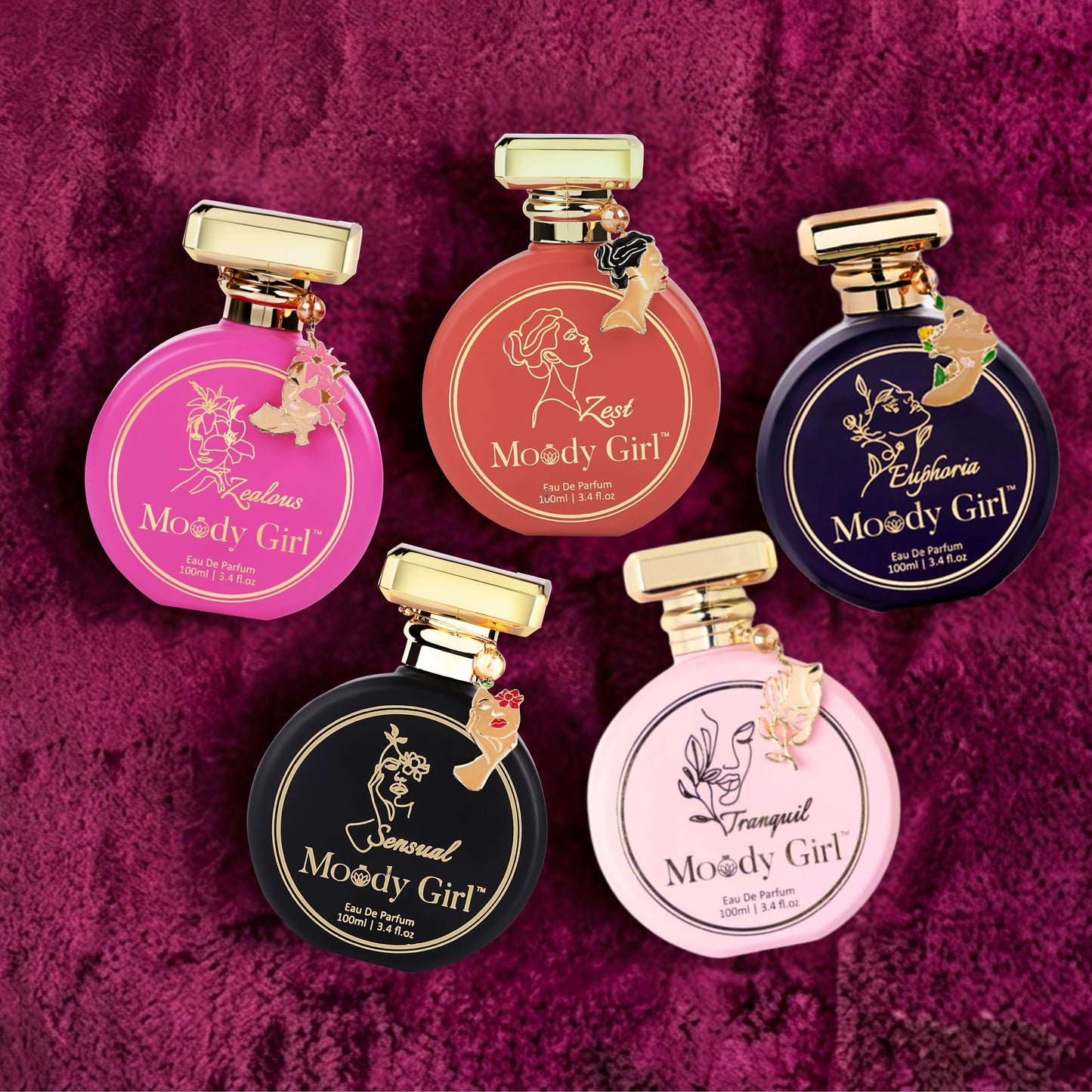 Five 'Moody Girl' perfume bottles on a purple textured background